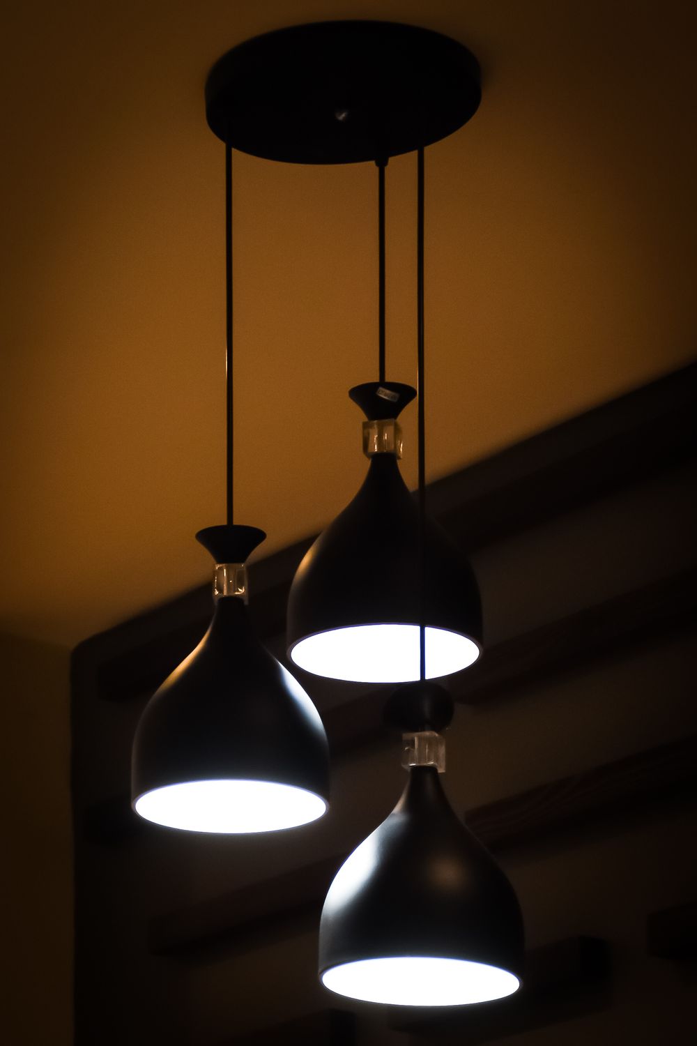 Warm pendant lights glowing in a contemporary room